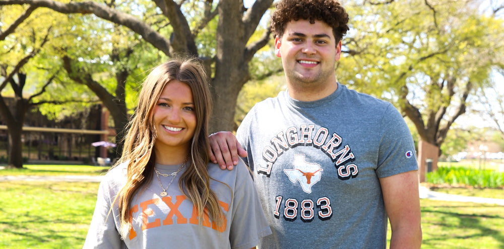 2 people wearing UT tshirts