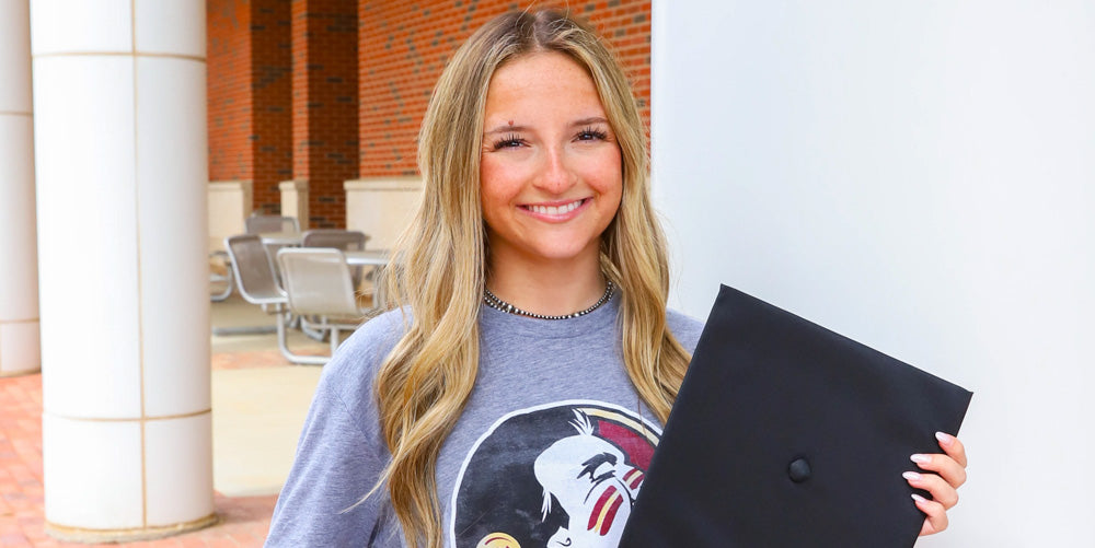 girl wearing a Florida State Alumni tshirt