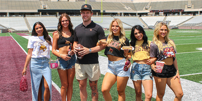 college students wearing Texas State University game day gear