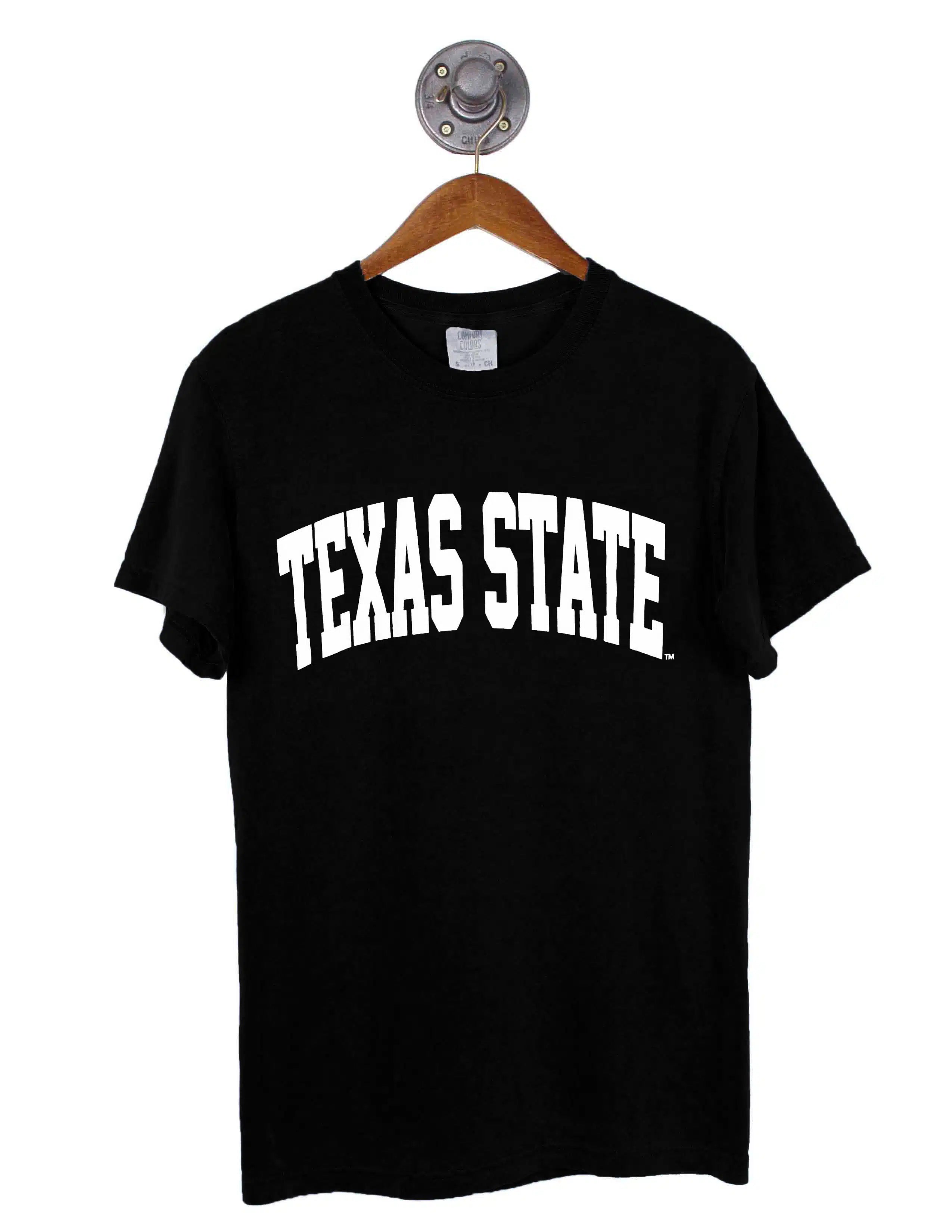 Black t-shirt with 'Texas State' text on a hanger against a white background