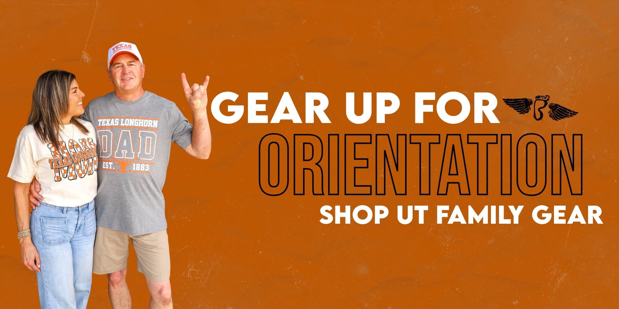 A couple stands smiling in University of Texas apparel against a burnt orange background. Text reads "Gear Up for Orientation, Shop UT Family Gear."