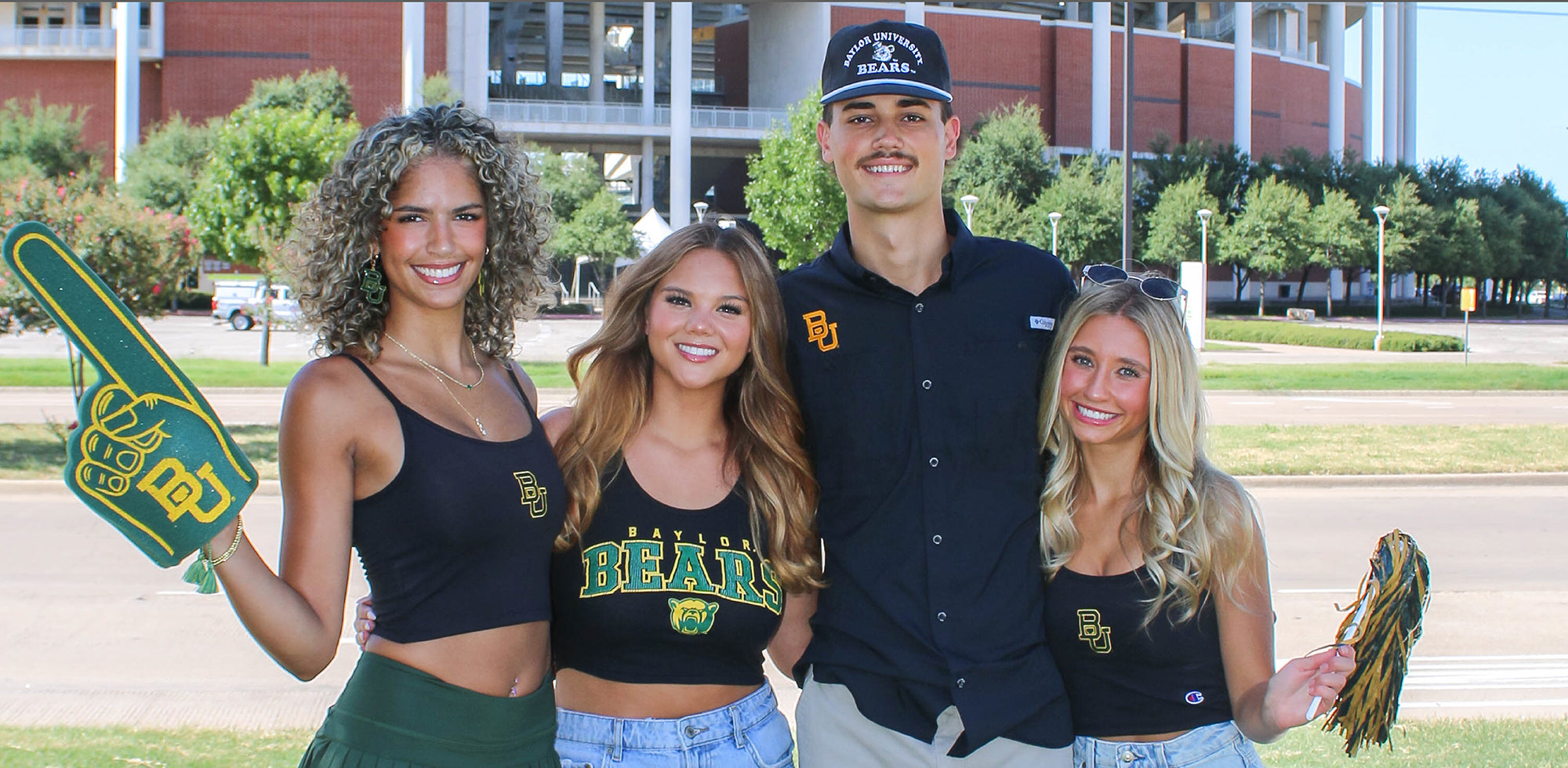BU Baylor Bear students wearing green Baylor University apparel at a football stadium with accessories
