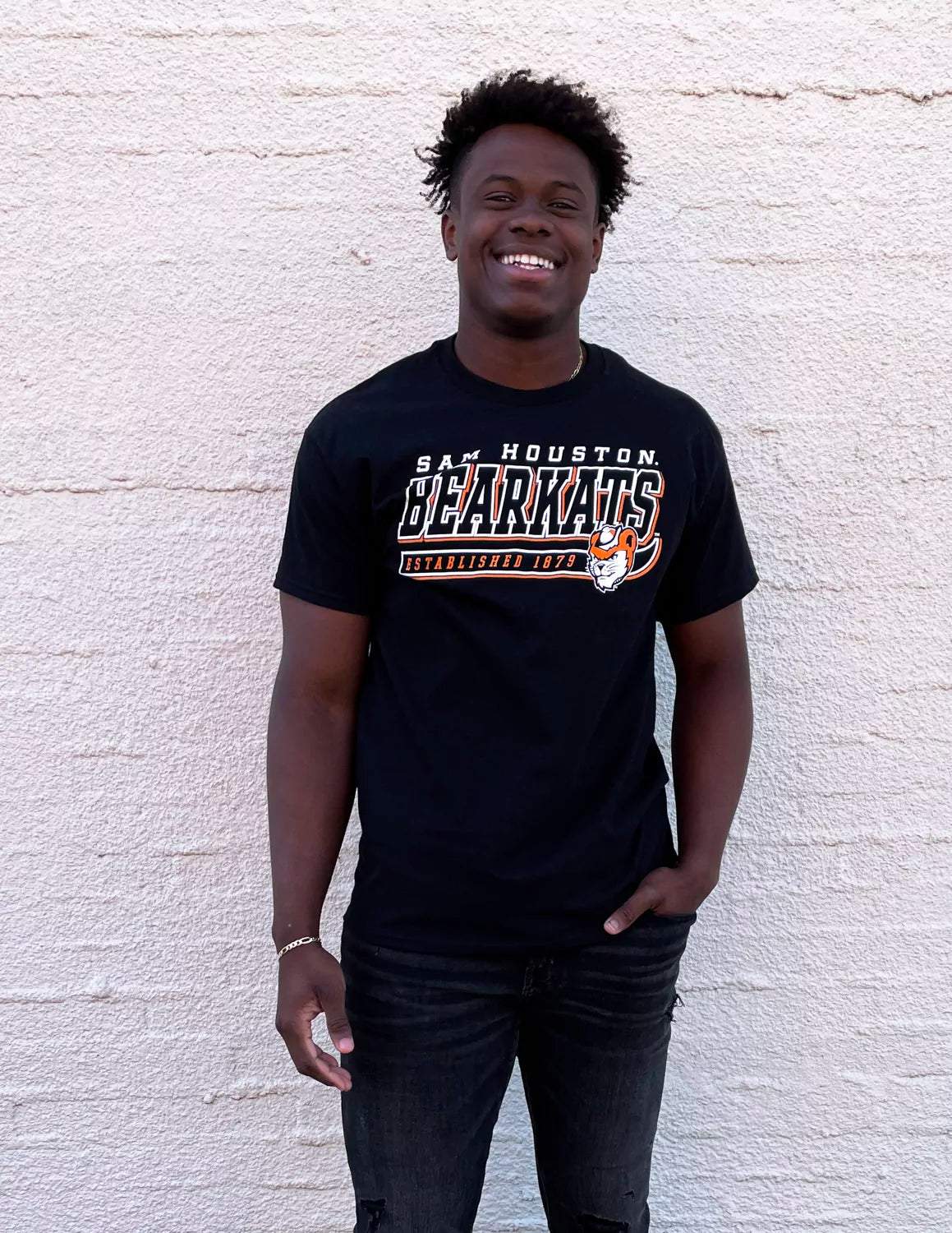 Sam Houston State University student wearing SHSU black apparel against a white background.