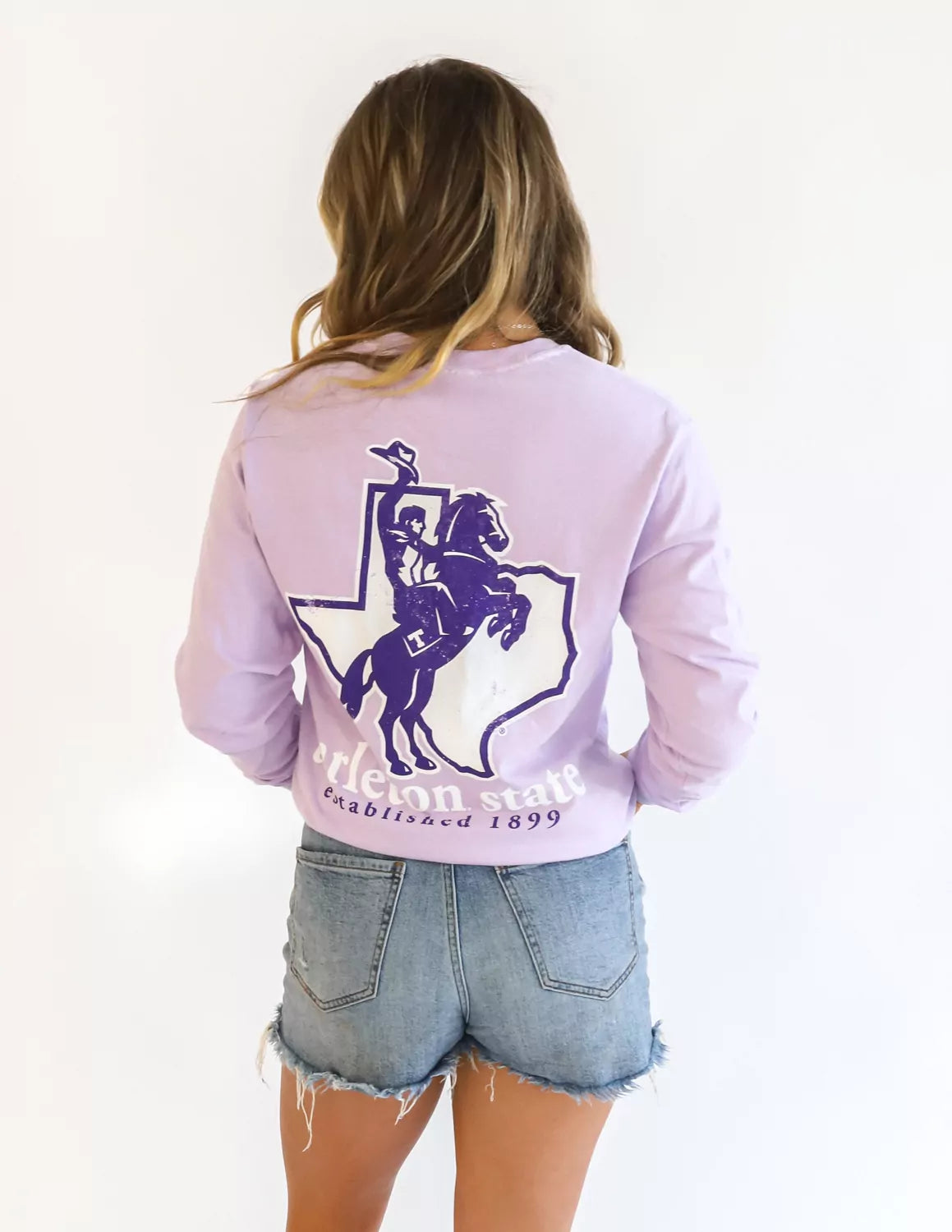 Tarleton State University student wearing light purple apparel against a white background.