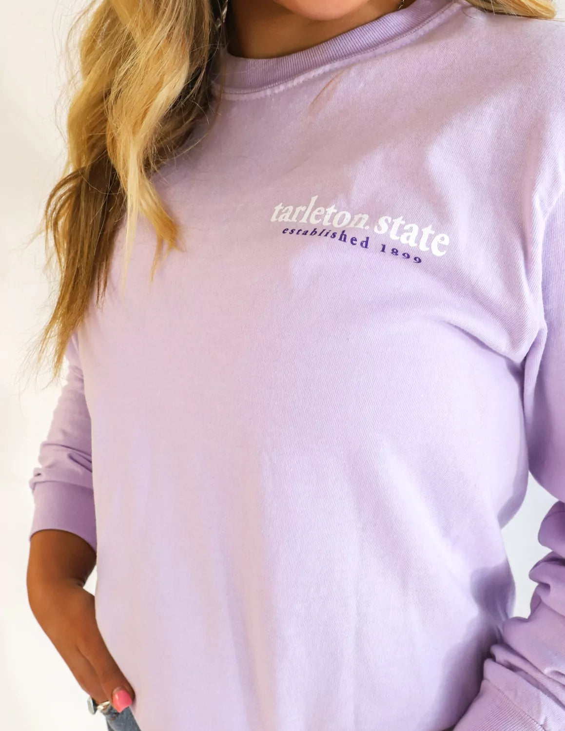 Tarleton State University Student wearing purple TSU apparel.