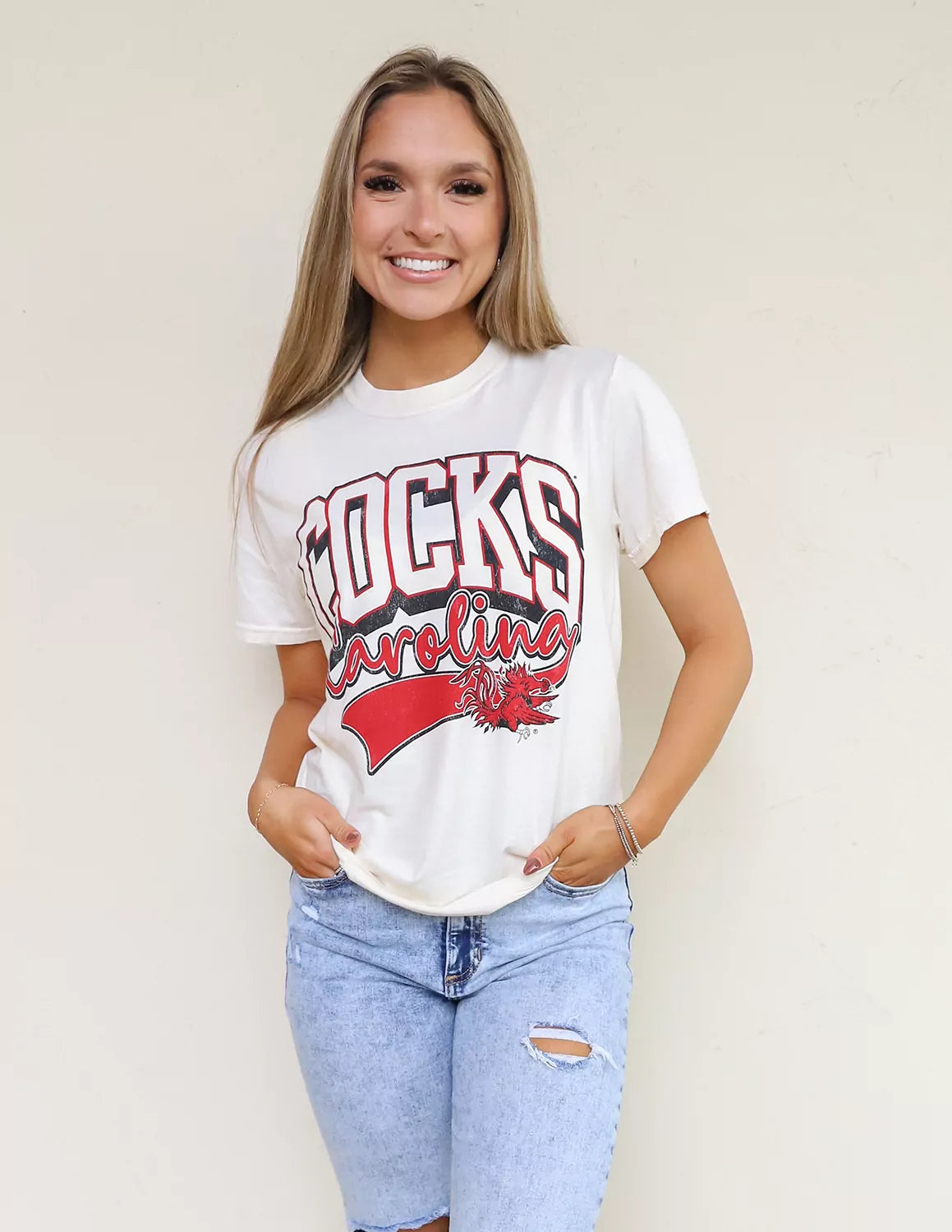 USC Gamecocks student wearing white University of South Carolina apparel against a white background.