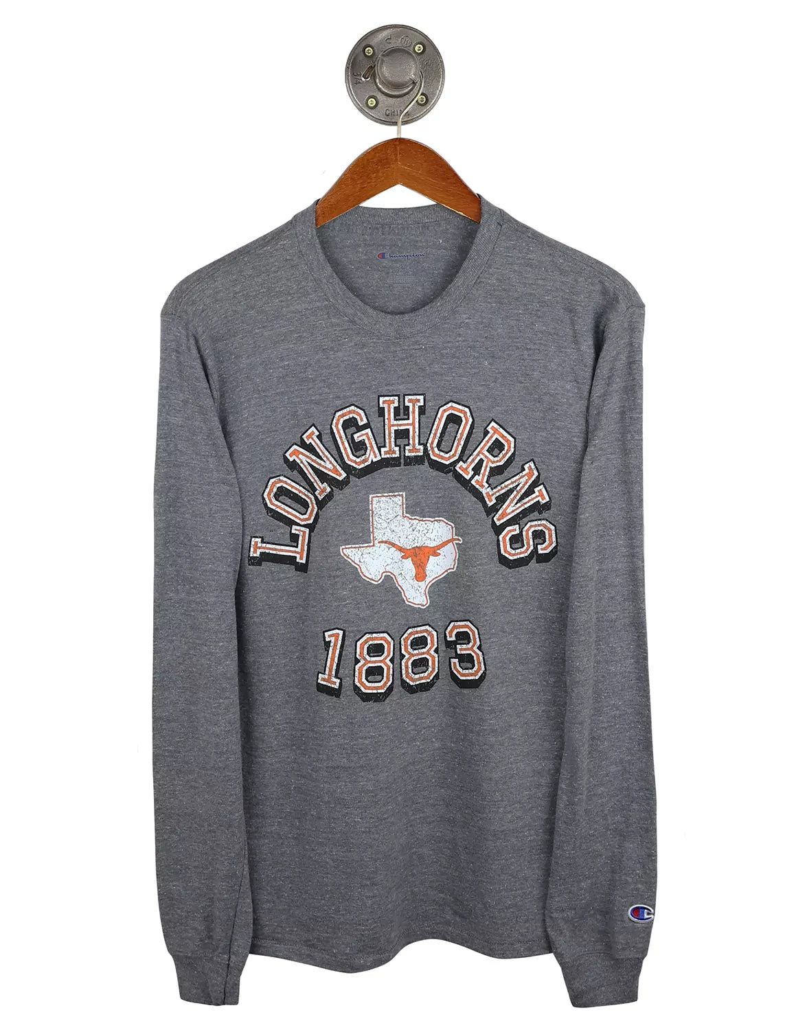 Heather grey University of Texas at Austin Champion unisex long-sleeve t-shirt with a Texas Longhorns logo in the middle and white, black, and burnt orange lettering surrounding the logo.