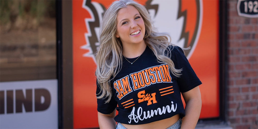 girl wearing a Sam Houston alumni tshirt