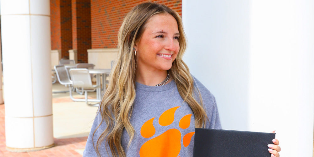 girl wearing a Sam Houston alumni tshirt