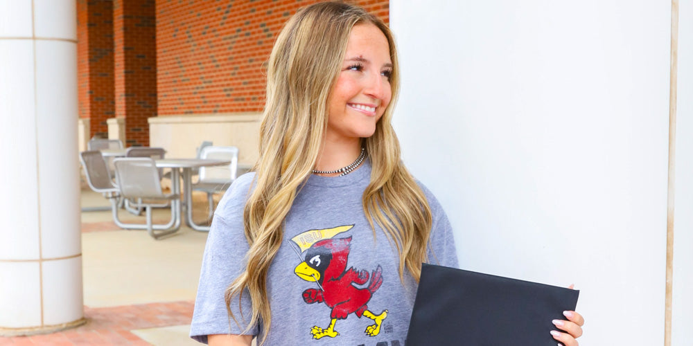 girl wearing an Iowa State Alumni tshirt
