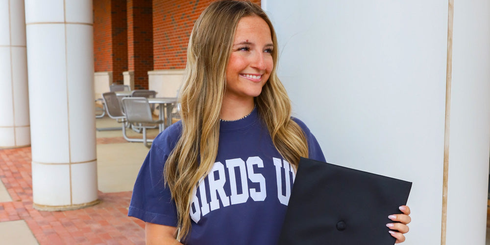 girl wearing a UTSA Birds Up tshirt