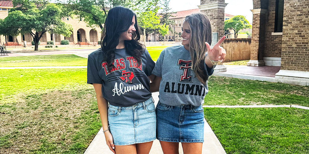 2 girls wearing Texas Tech alumni tshirts