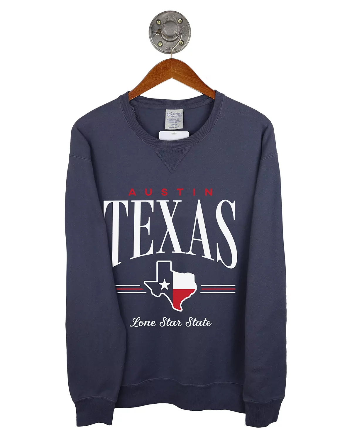 Navy blue Austin, Tx pigment dyed crewneck sweatshirt featuring a Texas Flag graphic inside a Texas State outline with red and white lettering. 