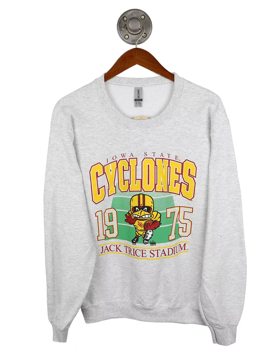 Ash grey unisex Iowa State University crewneck sweatshirt that features "Cyclones" text with an ISU logo and a football field graphic in the background. 