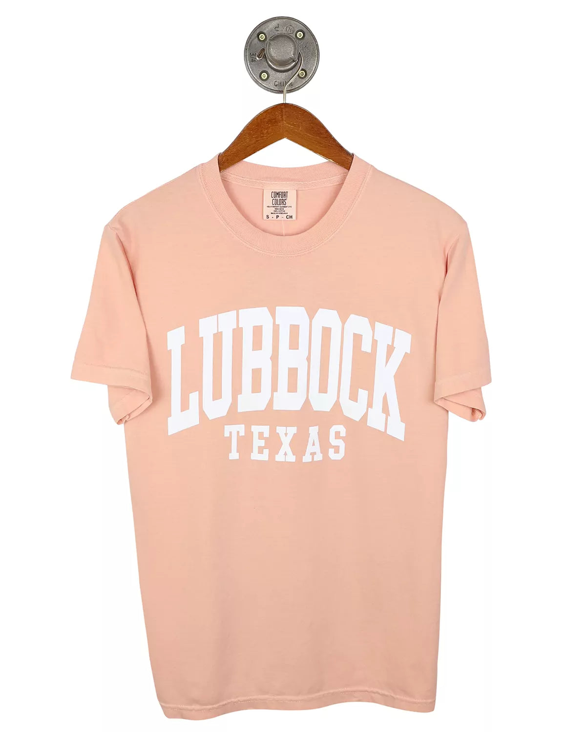 Peach unisex Lubbock, Tx t-shirt with white lettering.