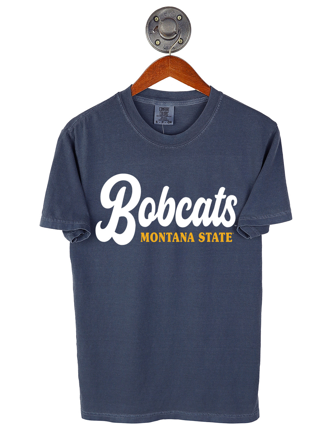 Denim Montana State University unisex Comfort Colors t-shirt that features white and gold lettering on the front. 