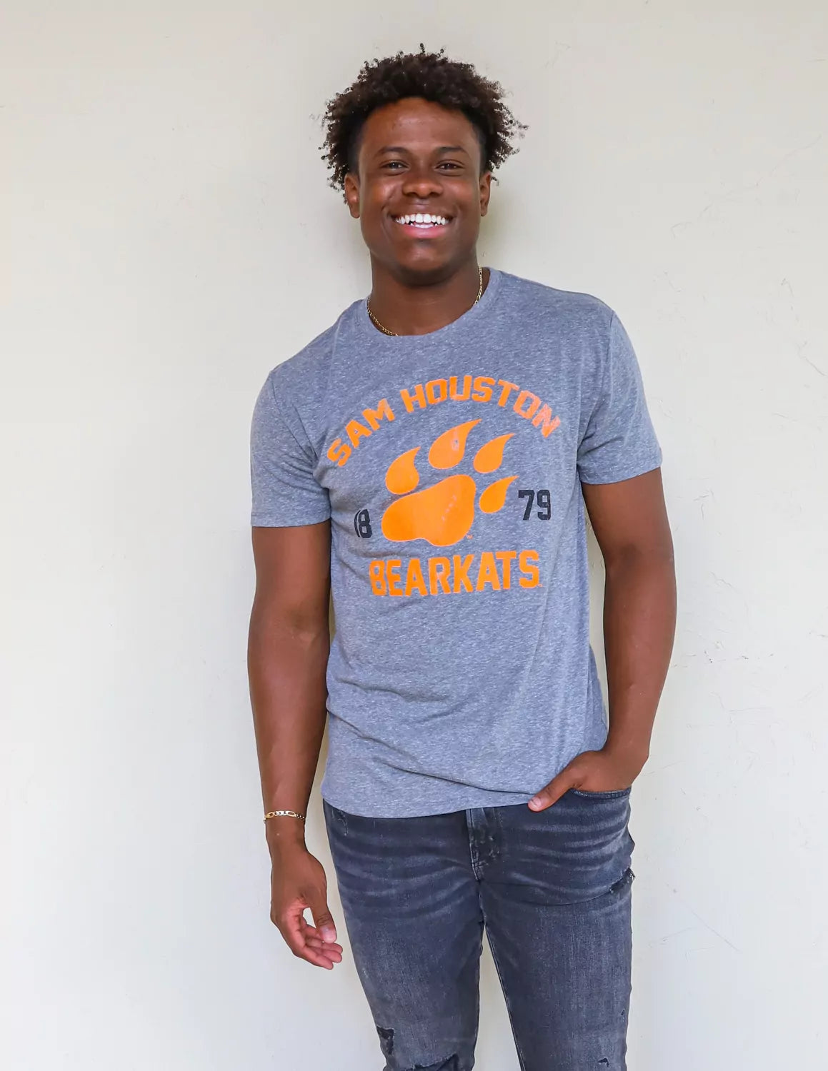 SHSU Bearkat Student wearing Sam Houston State University apparel against a white background.