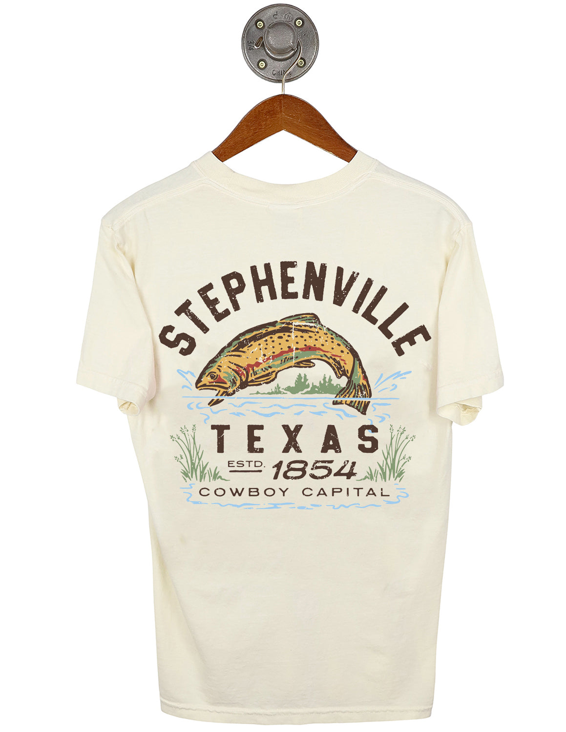 Back-view of ivory unisex Stephenville, Tx Comfort Colors t-shirt that features a bass jumping out of water graphic with brown lettering. 