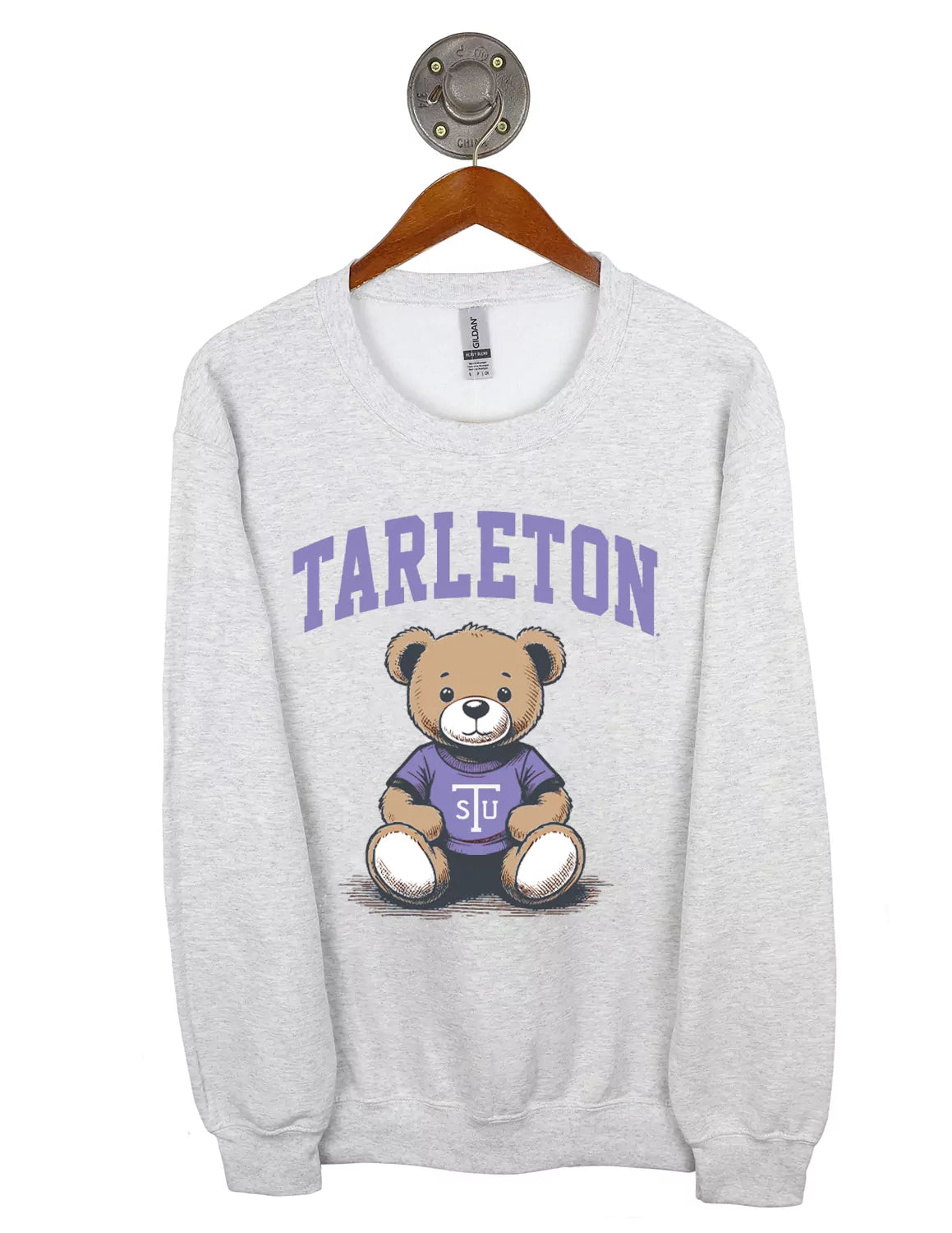 Ash grey Tarleton State University Gildan unisex crewneck sweatshirt featuring a teddy bear and purple lettering. 