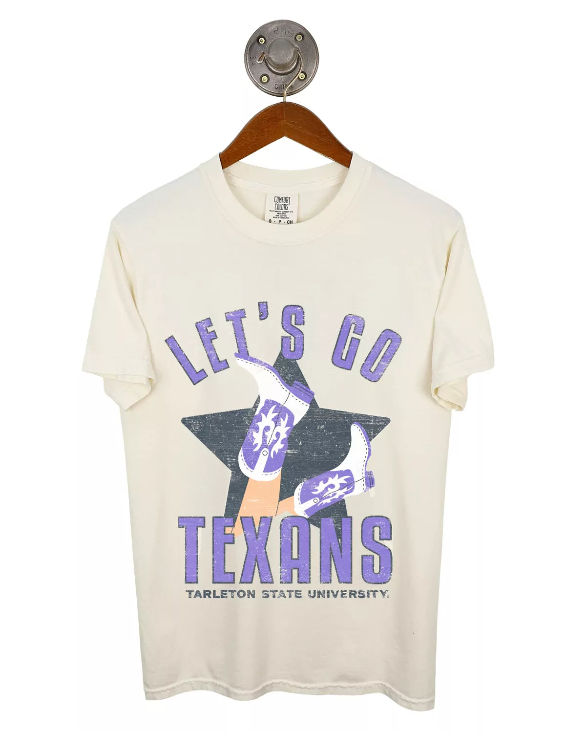 Ivory Tarleton State University unisex Comfort Colors t-shirt that features a cowgirl boots graphic with purple and black lettering. 