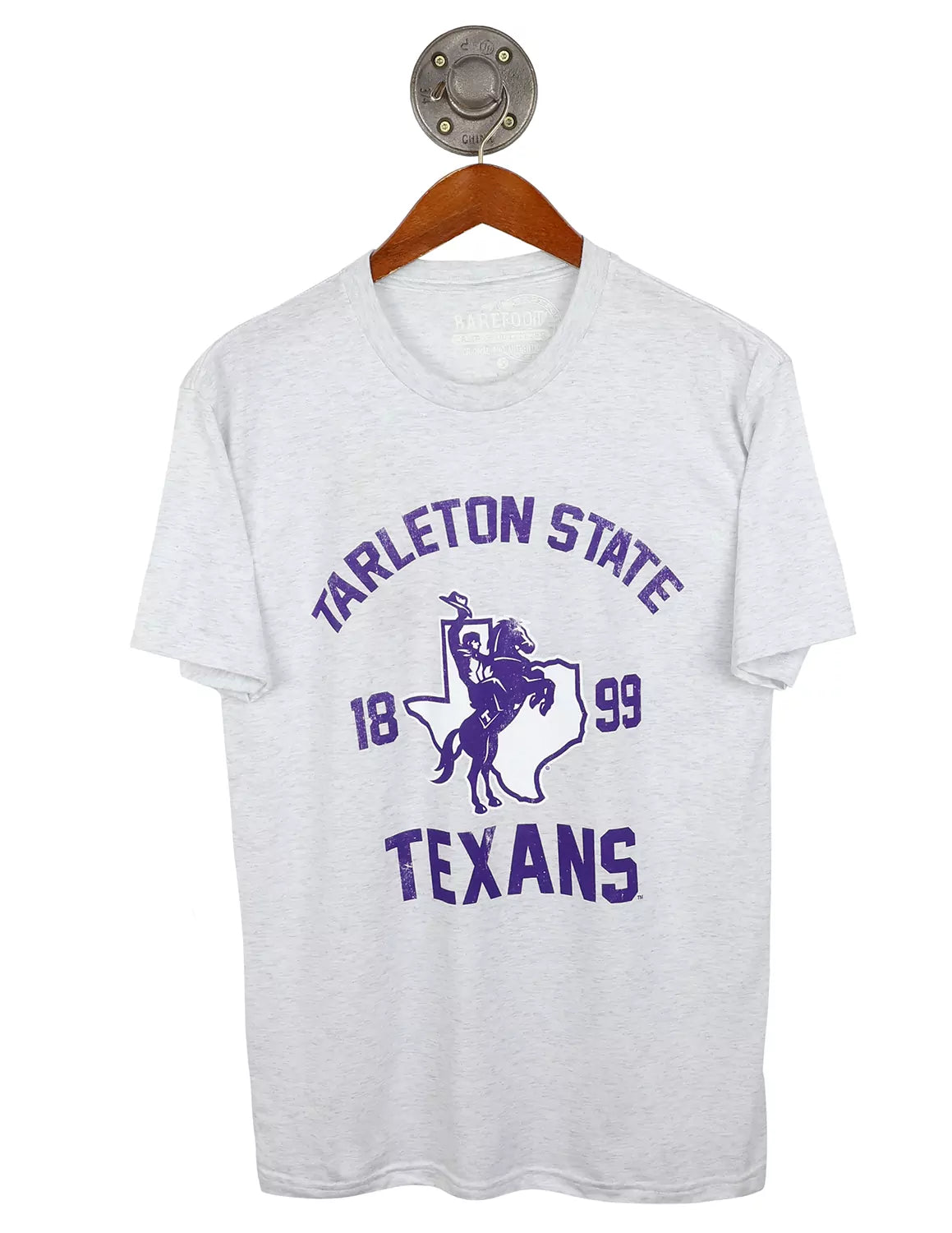White heather Tarleton State University unisex t-shirt featuring a Texan Rider loo and purple lettering around. 