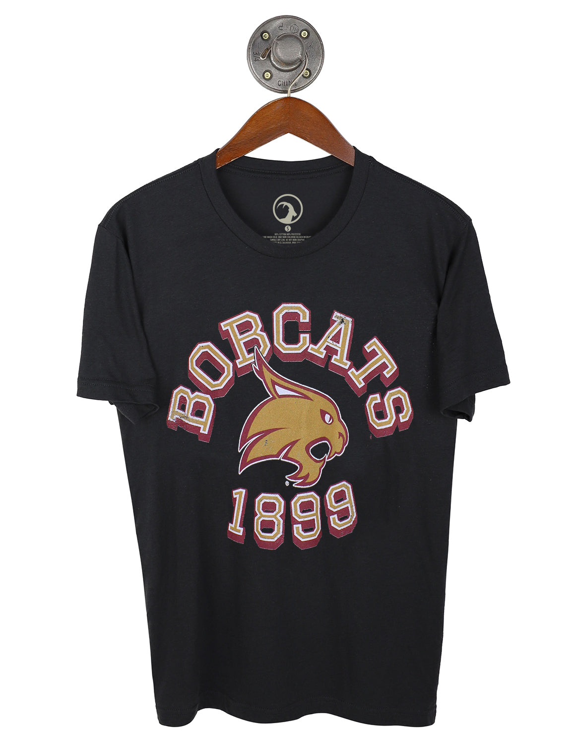 Graphite black unisex Texas State University t-shirt that features a Bobcats logo in the center with white, gold, and maroon lettering. 