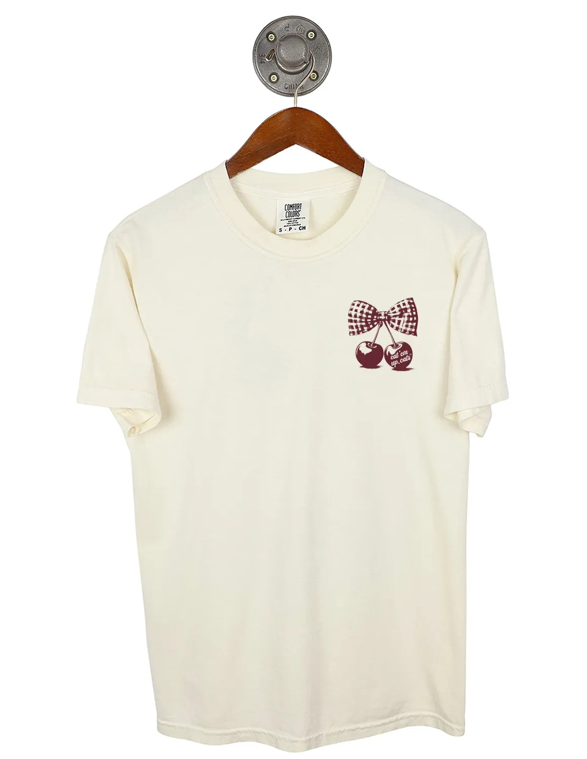 Ivory Texas State University unisex Comfort Colors t-shirt that features a left chest design of a cherry and bow graphic.  