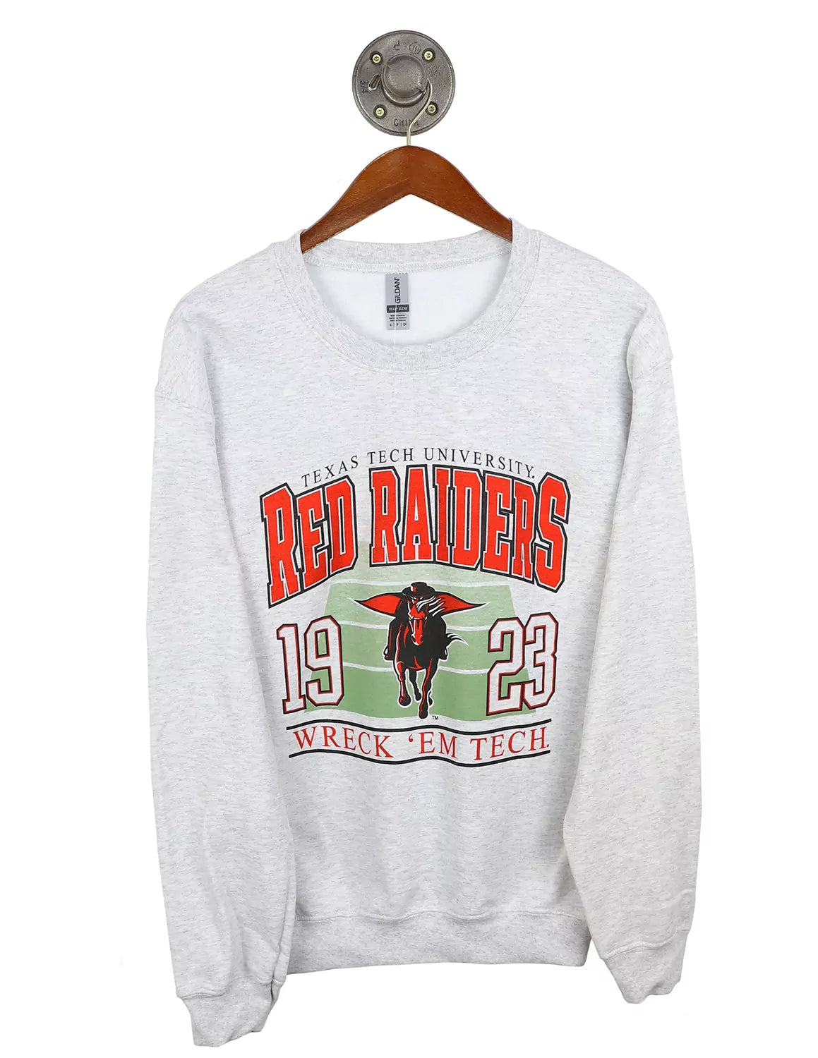 Ash grey Texas Tech University Gildan unisex crewneck sweatshirt featuring a football field graphic with the TTU Horseback Mascot logo in the middle and red and black lettering. 