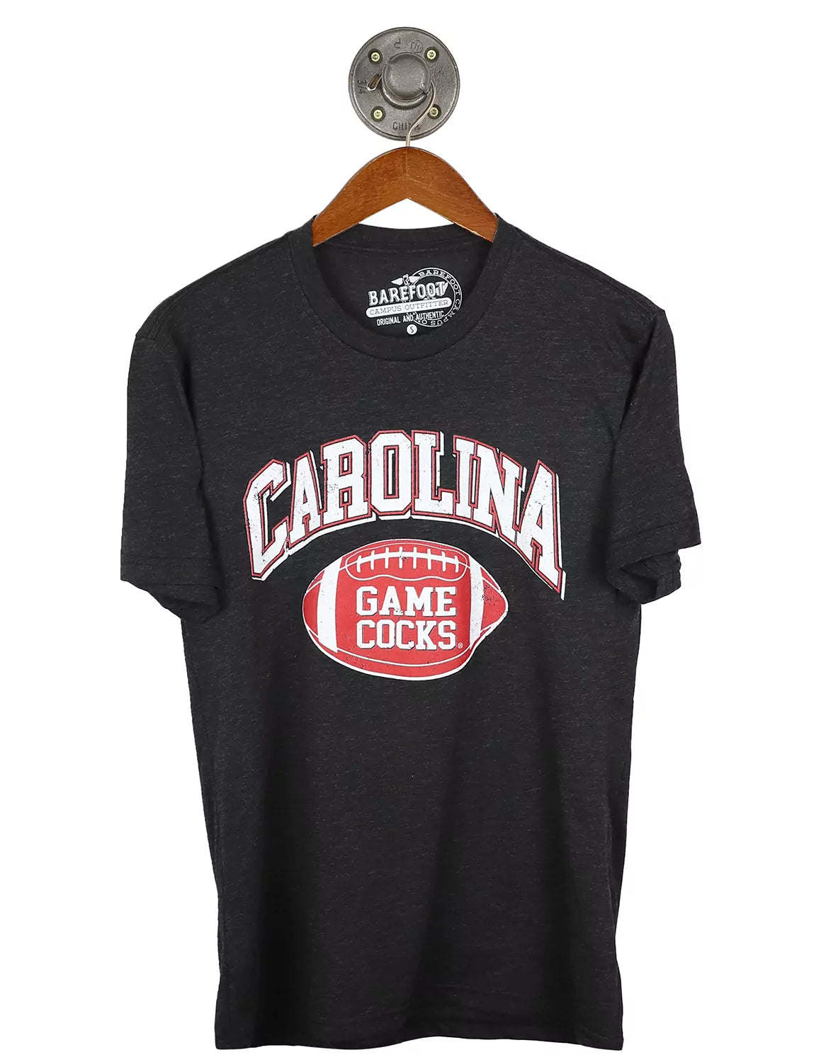 Vintage black University of South Carolina unisex short-sleeve t-shirt with a football graphic and white and garnet lettering. 