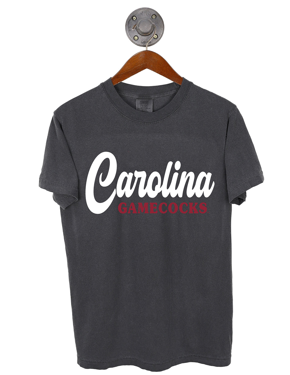Dark grey University of South Carolina unisex Comfort Colors t-shirt that features white and garnet lettering on the front. 