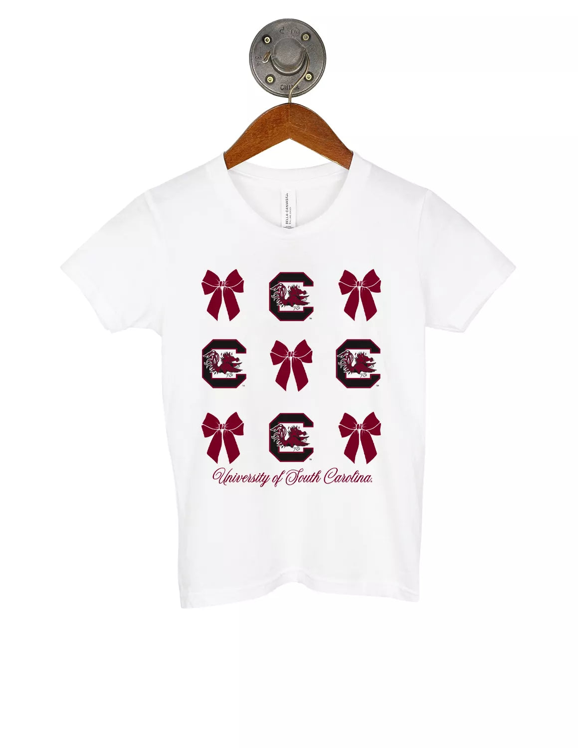White University of South Carolina youth t-shirt with an alternating bow graphic and USC logo stacked going down the shirt and garnet lettering at the bottom.